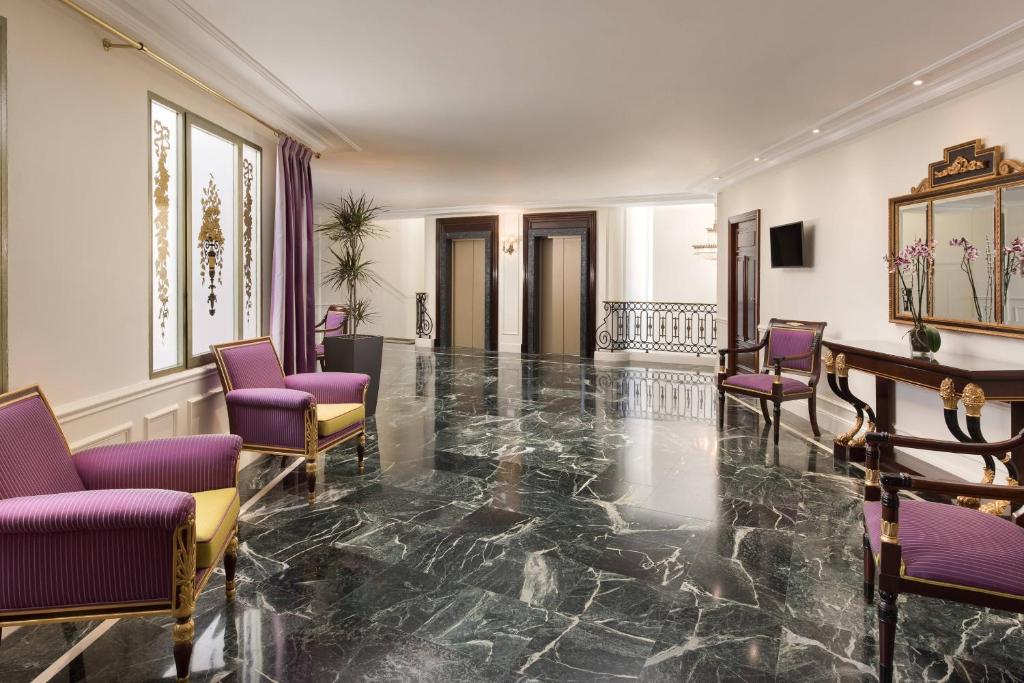 How Does the History of The Westin Palace, Madrid Enhance Its Modern Hospitality Experience? 